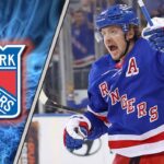 Artemi Panarin of the New York Rangers skating during a game, surrounded by NHL trade rumors regarding a return to Russia.