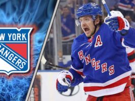 Artemi Panarin of the New York Rangers skating during a game, surrounded by NHL trade rumors regarding a return to Russia.