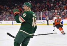 Bobby Brink of the Minnesota Wild celebrates a goal during a game.