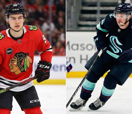 NHL News: Bedard Soars, Dunn’s Milestone & Huge Trade Rumors A split-screen photograph showing Chicago Blackhawks forward Connor Bedard (#98) standing on the ice in his red home jersey on the left, alongside Seattle Kraken defenseman Vince Dunn (#29) skating in his dark blue away jersey on the right.