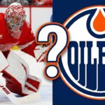 Rumor Mill: Is John Gibson Bound for Edmonton Despite Shutout Heroics? Split graphic featuring Detroit Red Wings goaltender John Gibson making a save on the left side, alongside the Edmonton Oilers team logo on the right side, with a large white question mark superimposed in the center symbolizing trade rumors between the two clubs.