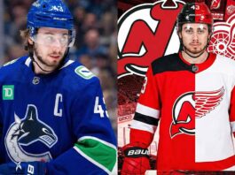 Is Quinn Hughes Leaving? The Trade Packages That Could Shake the NHL A split image graphic illustrating NHL trade rumors involving Quinn Hughes. On the left side, Hughes is pictured on the ice wearing his current blue Vancouver Canucks jersey. The right side is a composite graphic showing Hughes wearing a jersey split down the middle—the left half is the red and black of the New Jersey Devils, and the right half is the red and white of the Detroit Red Wings
