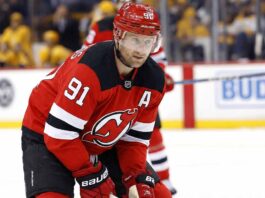 Steven Stamkos Linked to New Jersey Devils: Analyzing the Blockbuster Rumor Nashville Predators captain Steven Stamkos skating during a game, subject of New Jersey Devils trade rumors.