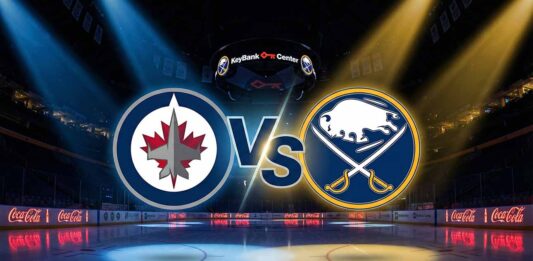 A stylized digital illustration of the Winnipeg Jets and Buffalo Sabres logos colliding with a large "Vs" in the center. The background features the interior of the KeyBank Center arena with spotlights illuminating the ice and Coca-Cola advertisements on the rink boards.