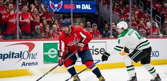 Dallas Stars vs Washington Capitals: TV Channel, Stream, Odds & Prediction (Jan 7, 2026) Washington Capitals captain Alex Ovechkin (8) skates with the puck while being defended by Dallas Stars defenseman Miro Heiskanen (4) during an NHL game at Capital One Arena. Fans fill the stands and a scoreboard reads "WAS vs DAL" in the background.