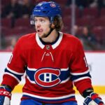 Is Artemi Panarin the Missing Piece? The Cost of bringing the “Breadman” to Montreal Artemi Panarin depicted wearing a red Montreal Canadiens home uniform and blue helmet, standing on the ice with his tongue sticking out during a game.