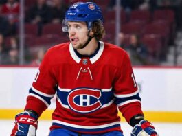 Is Artemi Panarin the Missing Piece? The Cost of bringing the “Breadman” to Montreal Artemi Panarin depicted wearing a red Montreal Canadiens home uniform and blue helmet, standing on the ice with his tongue sticking out during a game.