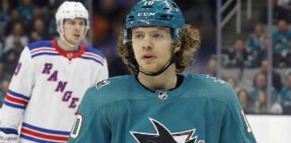 A composite image showing Artemi Panarin in a teal San Jose Sharks uniform and helmet amidst trade speculation, with players wearing white New York Rangers away jerseys visible in the background.