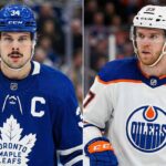 A split-screen photograph showing two NHL team captains. On the left is Auston Matthews of the Toronto Maple Leafs, wearing his blue home jersey with a 'C'. On the right is Connor McDavid of the Edmonton Oilers, wearing his white away jersey also with a 'C'. Both players are in full gear and helmets on the ice.