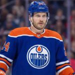 Concept images showing defenseman Jamie Oleksiak wearing Edmonton Oilers home jersey, illustrating a potential trade scenario.