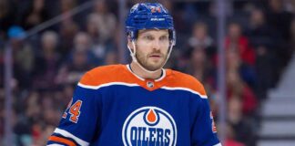 Concept images showing defenseman Jamie Oleksiak wearing Edmonton Oilers home jersey, illustrating a potential trade scenario.
