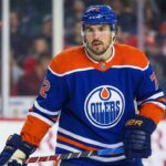 The Hidden Cost: How the Edmonton Oilers Can Steal Justin Faulk from the St. Louis Blues A photo of St. Louis Blues defenseman Justin Faulk in an Edmonton Oilers home jersey.