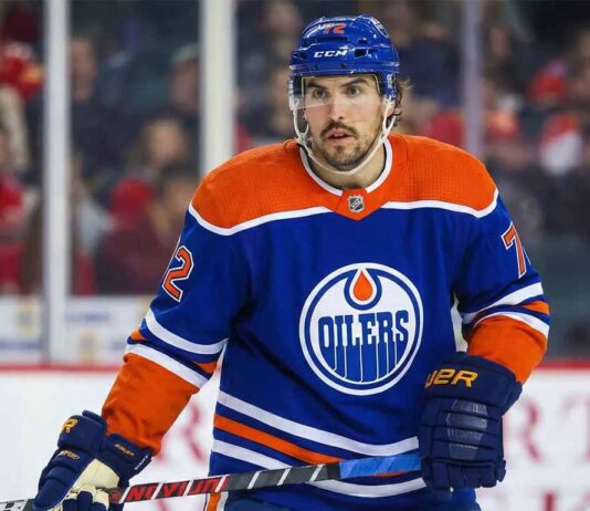 The Hidden Cost: How the Edmonton Oilers Can Steal Justin Faulk from the St. Louis Blues A photo of St. Louis Blues defenseman Justin Faulk in an Edmonton Oilers home jersey.