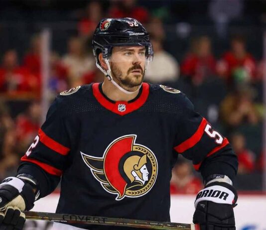 A photo illustration showing NHL defenseman MacKenzie Weegar on the ice, wearing a black Ottawa Senators home jersey with the centurion logo and number 52, holding his hockey stick.
