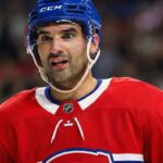 Habs Trade Shift: Why Kadri Is No Longer the Target Nazem Kadri pictured in a Montreal Canadiens uniform and blue helmet during a stoppage in play.