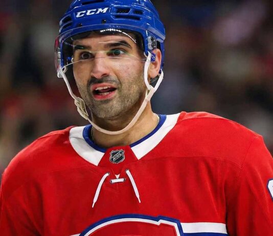 Habs Trade Shift: Why Kadri Is No Longer the Target Nazem Kadri pictured in a Montreal Canadiens uniform and blue helmet during a stoppage in play.