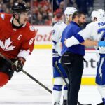 Split photograph contrasting Olympic fates ahead of the 2026 Milano Cortina Winter Games. On the left, Sidney Crosby skates dynamically in his red Team Canada jersey, ready for Italy. On the right, an injured Brayden Point, wearing a white Tampa Bay Lightning jersey, is being supported by a trainer and teammate as he leaves the ice, indicating the injury that will keep him out of the Olympics.