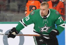 A visual mock-up depicting current Philadelphia Flyers defenseman Rasmus Ristolainen wearing a green Dallas Stars home jersey, number 70, while on the ice. This concept image illustrates growing NHL trade rumors linking him to the Stars organization.