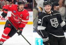 Team Canada Rolls, But Kevin Fiala’s Brutal Injury Shakes Up NHL Trade Market A split photograph featuring two professional hockey players. On the left side, Sidney Crosby is shown skating intently in his red Team Canada jersey with the captain's 'C' visible. On the right side, Kevin Fiala is pictured smiling while wearing a black Los Angeles Kings jersey.