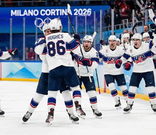 Team USA men's ice hockey players celebrate their thrilling 2-1 overtime gold medal victory against Canada at the 2026 Winter Olympics, dominating today's NHL news.