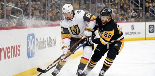 Will the Crosby-less Penguins Survive the Golden Knights? Vegas Golden Knights captain Mark Stone (#61) battles for possession of the puck along the boards against Pittsburgh Penguins defenseman Kris Letang (#58) during an NHL game at PPG Paints Arena.