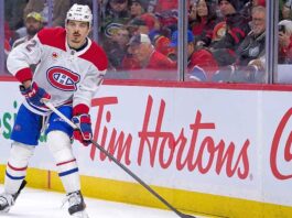 Montreal Canadiens Trade Rumors: Arber Xhekaj Offseason Move Montreal Canadiens defenseman Arber Xhekaj, wearing jersey #72, skates along the ice during an NHL game. He is looking up while holding his stick.