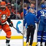 Toronto Maple Leafs captain Auston Matthews down on the ice with a season-ending knee injury following a controversial knee-on-knee hit by Anaheim Ducks captain Radko Gudas.