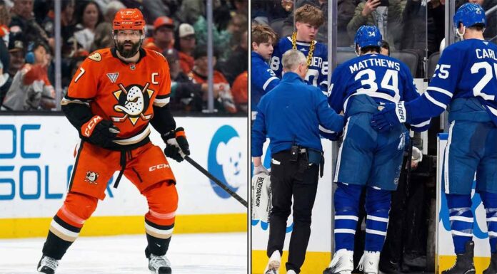 Toronto Maple Leafs captain Auston Matthews down on the ice with a season-ending knee injury following a controversial knee-on-knee hit by Anaheim Ducks captain Radko Gudas.