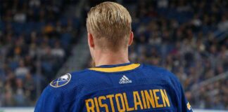 Philadelphia Flyers defenseman Rasmus Ristolainen, seen here from the back during a game, is the subject of trade rumors linking him to the Buffalo Sabres.