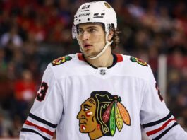 Chicago Blackhawks Trade Rumors: Targeting Toronto Maple Leafs’ Matthew Knies A detailed jersey swap visualization showing Toronto Maple Leafs forward Matthew Knies wearing a white Chicago Blackhawks uniform with number 23, illustrating NHL trade rumors between the two teams.