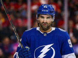 Tampa Bay Lightning Kadri Trade: Is a Blockbuster Brewing? Calgary Flames center Nazem Kadri (91) wears a Tampa Bay Lightning jersey and helmet.