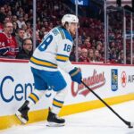 St. Louis Blues center Robert Thomas #18 skating on the ice at the Bell Centre in Montreal during a game against the Canadiens, a potential destination in NHL trade rumors.