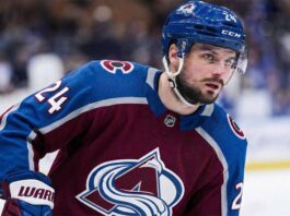 A concept image depicting current Toronto Maple Leafs center Scott Laughton wearing a Colorado Avalanche burgundy uniform and blue helmet amidst NHL trade deadline rumors.