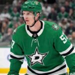 Why Tyler Myers Rejected Detroit for the Dallas Stars Trade New Dallas Stars defenseman Tyler Myers wearing number 57 in the green home uniform on the ice following his trade from the Vancouver Canucks.