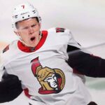 Ottawa Senators forward Brady Tkachuk looking determined on the ice, amid NHL trade rumors linking him to the New Jersey Devils.