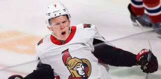 Ottawa Senators forward Brady Tkachuk looking determined on the ice, amid NHL trade rumors linking him to the New Jersey Devils.