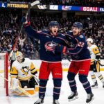Columbus Blue Jackets (CBJ) young stars Adam Fantilli and Cole Sillinger celebrate after scoring a goal against the Pittsburgh Penguins.