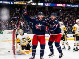 Columbus Blue Jackets (CBJ) young stars Adam Fantilli and Cole Sillinger celebrate after scoring a goal against the Pittsburgh Penguins.