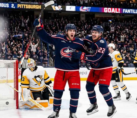Columbus Blue Jackets (CBJ) young stars Adam Fantilli and Cole Sillinger celebrate after scoring a goal against the Pittsburgh Penguins.
