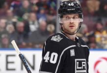 Elias Pettersson visual concept showing the center wearing a black Los Angeles Kings uniform and helmet with number 40, relevant to NHL trade rumors.