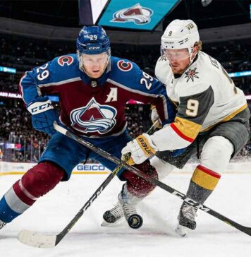 How to Watch Vegas Golden Knights vs Colorado Avalanche: TV & Stream A dynamic photo of Colorado Avalanche center Nathan MacKinnon (#29) battling Vegas Golden Knights center Jack Eichel (#9) for puck possession during a high-stakes NHL game at Ball Arena.