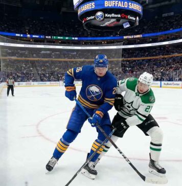 How to Watch Dallas Stars vs Buffalo Sabres Tonight: TV Channels & Stream Buffalo Sabres defenseman Rasmus Dahlin (26) in blue battles Dallas Stars forward Jason Robertson (21) in white for the puck during an NHL game at KeyBank Center.