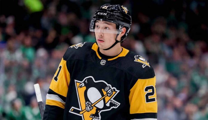 A mockup image of Dallas Stars forward Jason Robertson wearing a black and gold Pittsburgh Penguins hockey jersey.