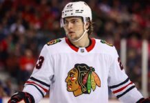Matthew Knies wearing Chicago Blackhawks jersey amidst NHL trade rumors