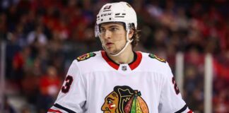 Matthew Knies wearing Chicago Blackhawks jersey amidst NHL trade rumors