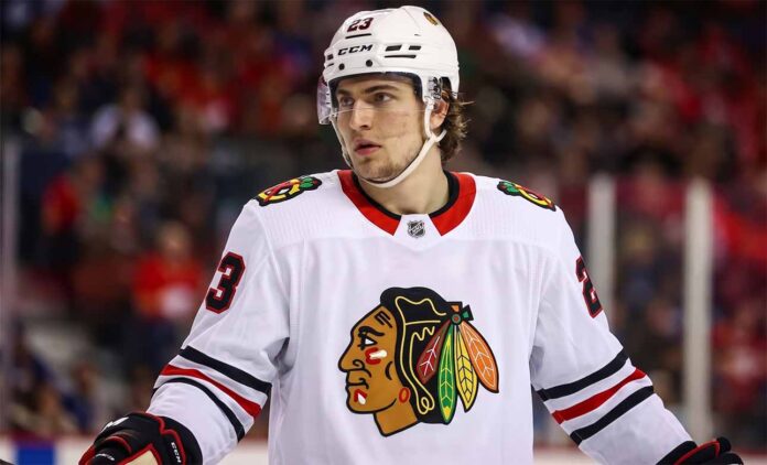 Matthew Knies wearing Chicago Blackhawks jersey amidst NHL trade rumors
