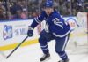 Toronto Maple Leafs forward Matthew Knies looking focused on the ice during an NHL game.
