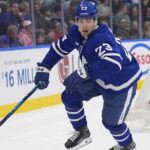 Toronto Maple Leafs forward Matthew Knies looking focused on the ice during an NHL game.