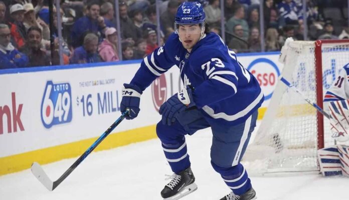 Toronto Maple Leafs forward Matthew Knies looking focused on the ice during an NHL game.