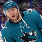 A photo-edit showing NHL defenseman Morgan Rielly wearing a teal San Jose Sharks alternate captain's jersey, number 44. speculative trade scenario image.